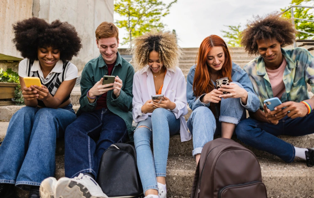 group of young people addicted to social media