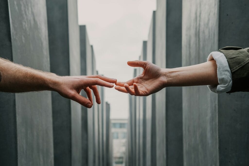 6 Powerful Ways to Help Needy Communities and Make a Lasting Impact two hands